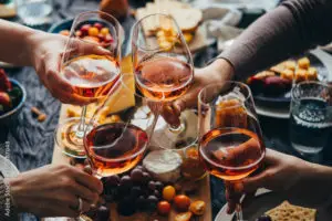 Girls grabbing a glass of wine for Galentine's Day in Hilton Head